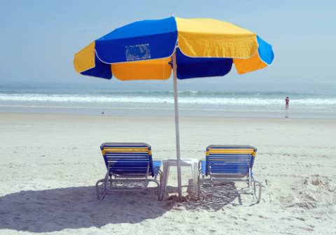 Beach chairs and umbrella